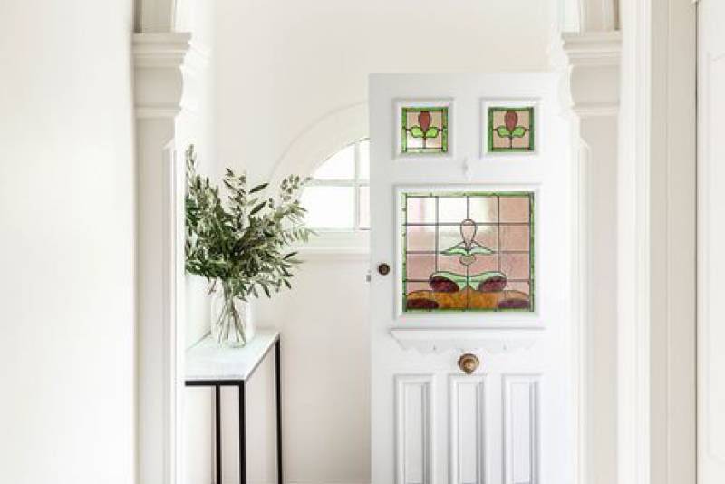 white interiors paired with plants